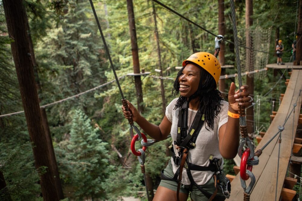 Defining Moments - Photo of camper on ropes course